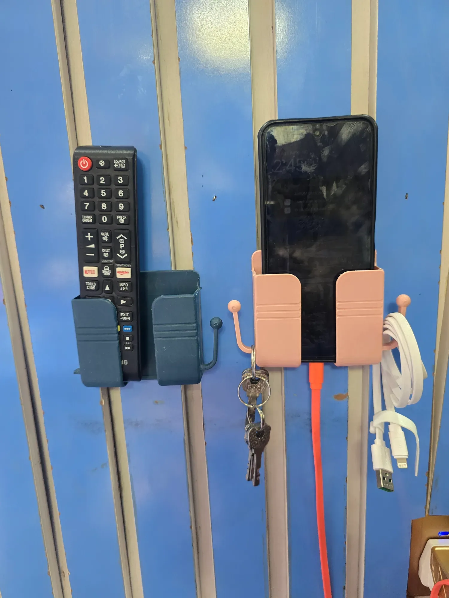 Phone Holder With Remote (2in1） | Almubaarak Variety Mall